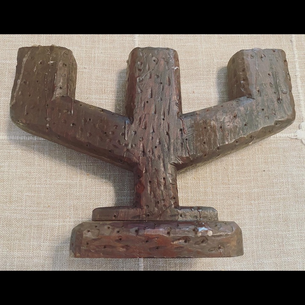 Brutalist style carved candelabra